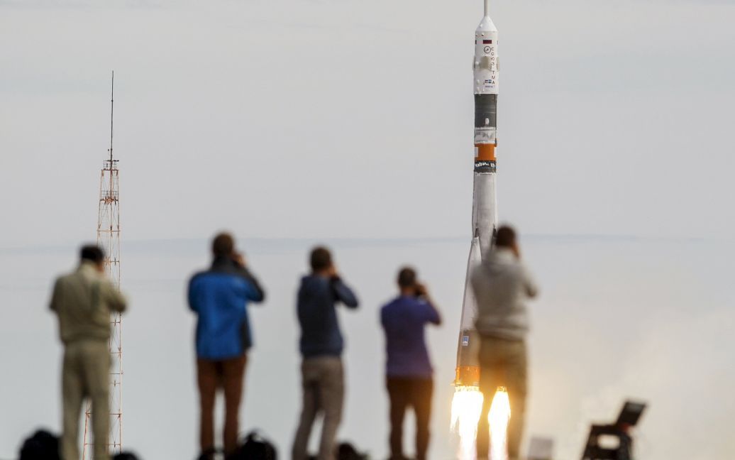 Фотографы снимают запуск ракеты в космос на &laquo;Байконуре&raquo; в Казахстане / © Reuters
