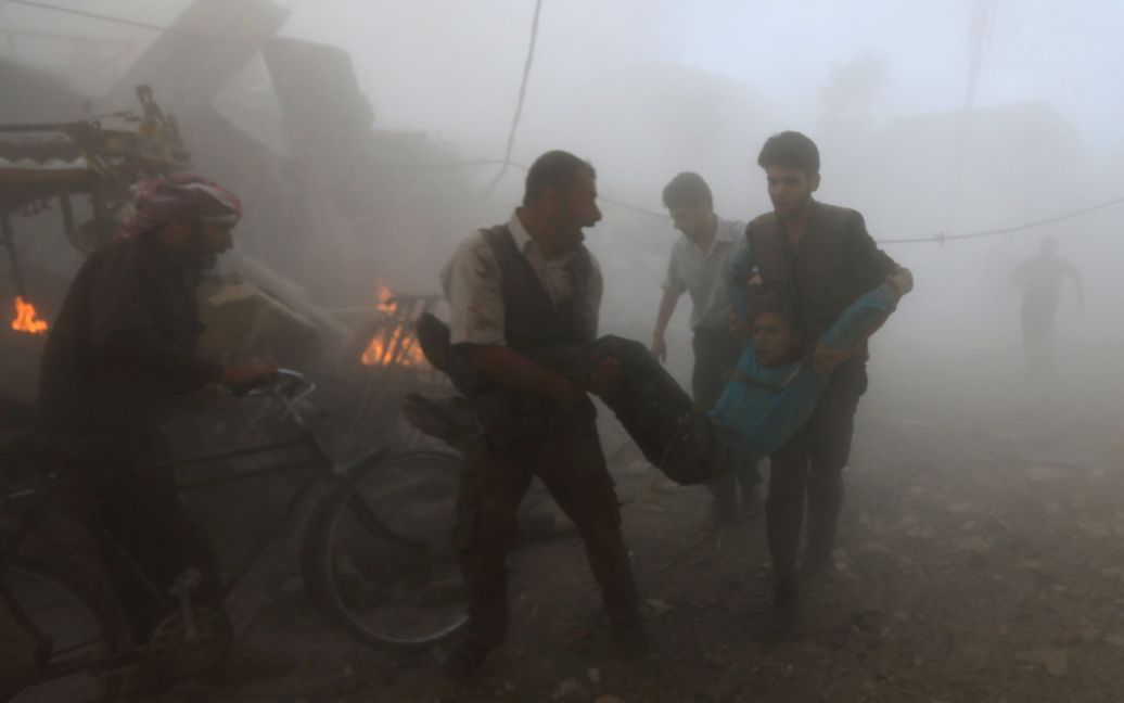 Авиаудар по городу Дума унес жизни десятков людей. / © Reuters