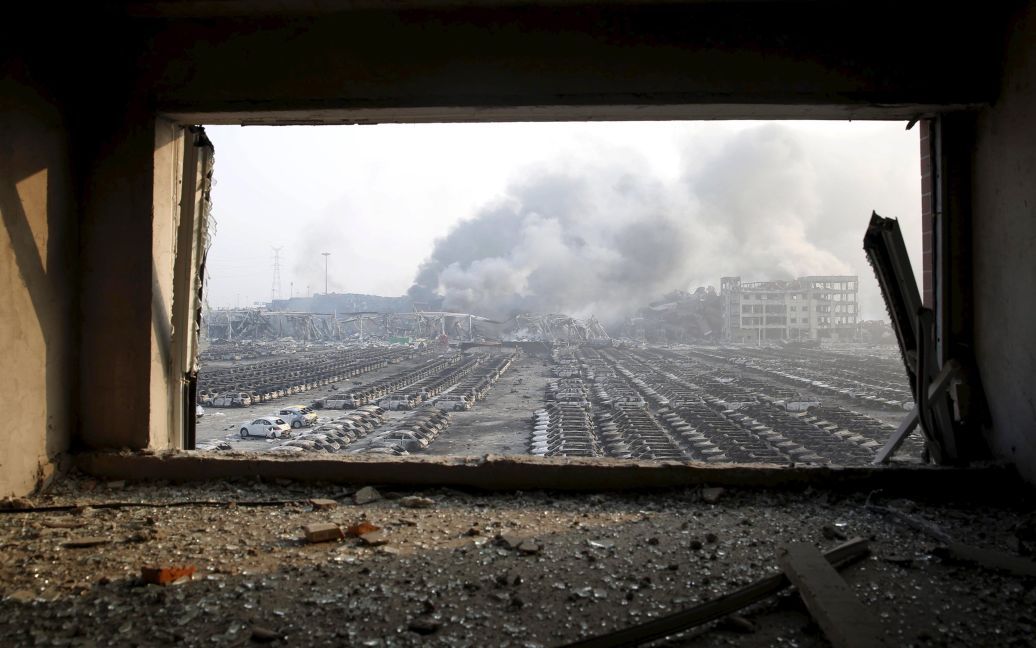 Взрыв в Тяньцзине разрушил часть города. / © Reuters