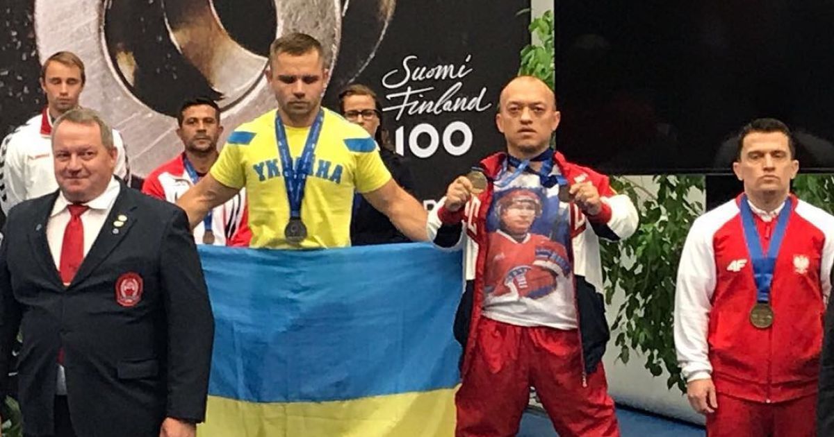 Російського спортсмена забанили за футболку з Путіним