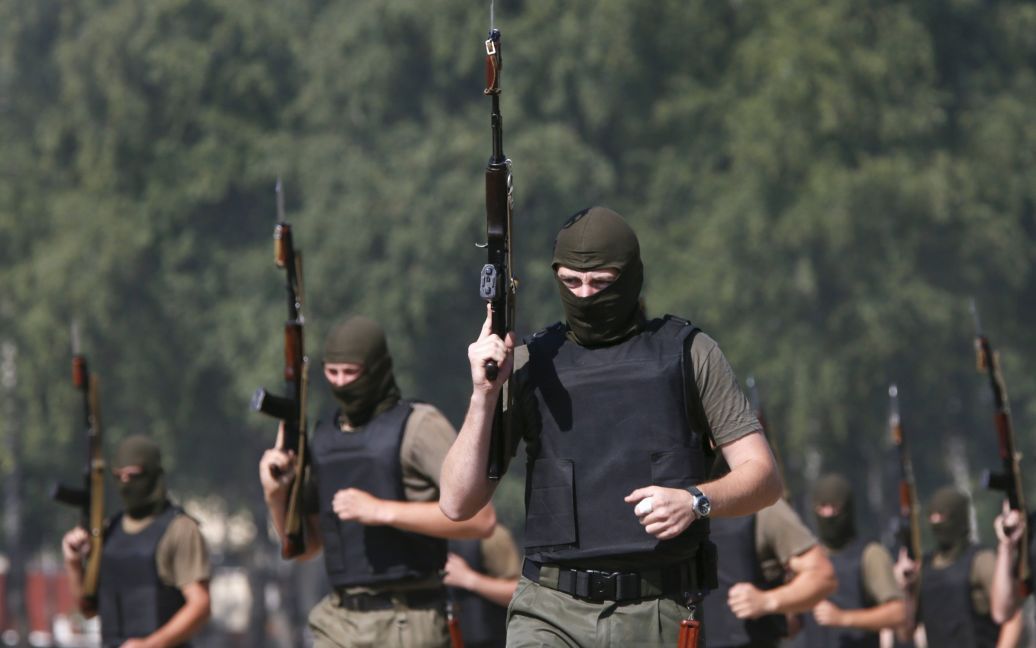 Бойцы учились стрелять на полигоне под Киевом / © Reuters