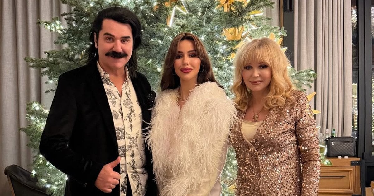 Павло Зібров із донькою і дружиною