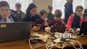 Блэкаут в Буче: город третьи сутки без света, люди греются и работают в горсовете (фото)