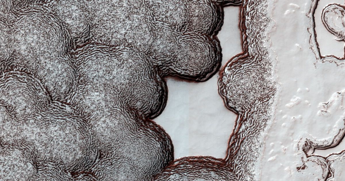 Орбітальний апарат робить великомасштабні фотографії марсіанської поверхні. / © NASA