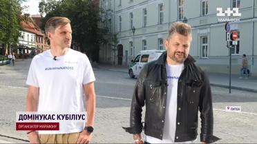 Сверхсложный марафон в Вильнюс: бегуны несут украинский флаг