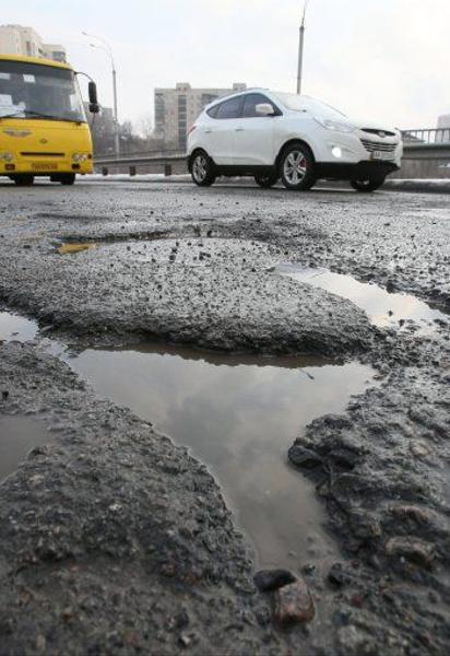как получить компенсацию за заезд в яму