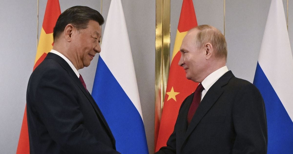 Сі Цзіньпін та Путін