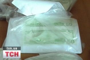 На Житомирщині фальшивомонетник друкував долари на принтері