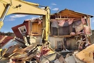 В США міста-банкрути зноситимуть бульдозерами