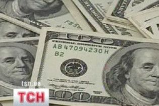 Долар впаде через фінансову політику США