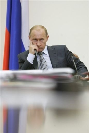 путін