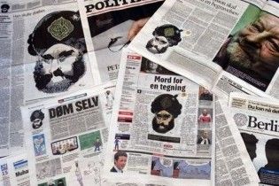 Меркель наградила художника, который рисовал карикатуры на Мухаммеда