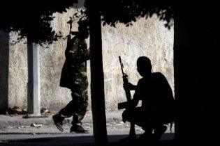Повстанці захопили частину рідного міста Каддафі