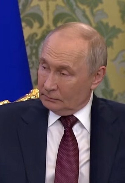 Путин