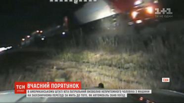 Американский патрульный спас бессознательного мужчину от наезда поезда