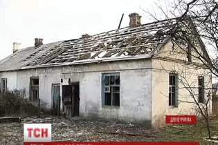 Жителі напівзруйнованого Опитного вже другий рік зимують без світла та тепла