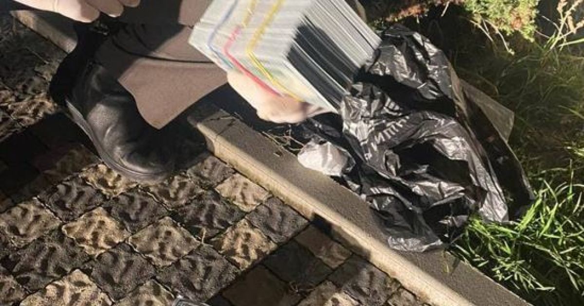 Вимагали 100 тисяч доларів псевдоборгу: поліція затримала рекетирів (фото)
