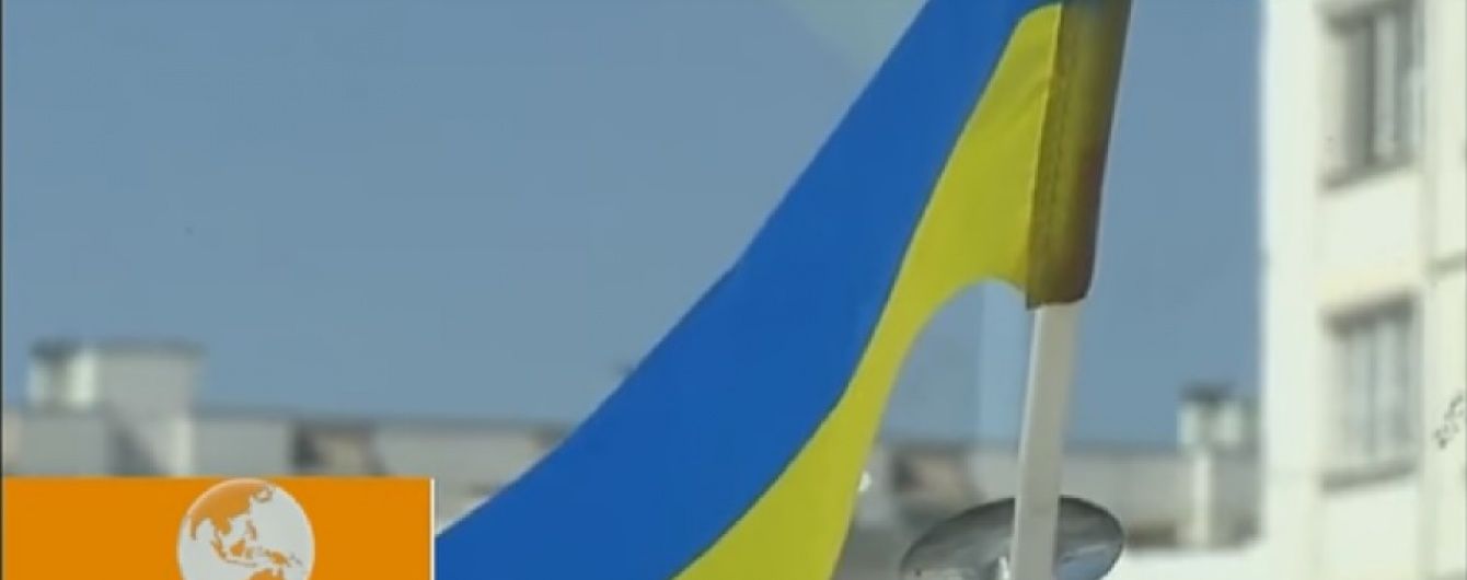 У Білорусі росіяни побили чоловіка за український прапор у машині