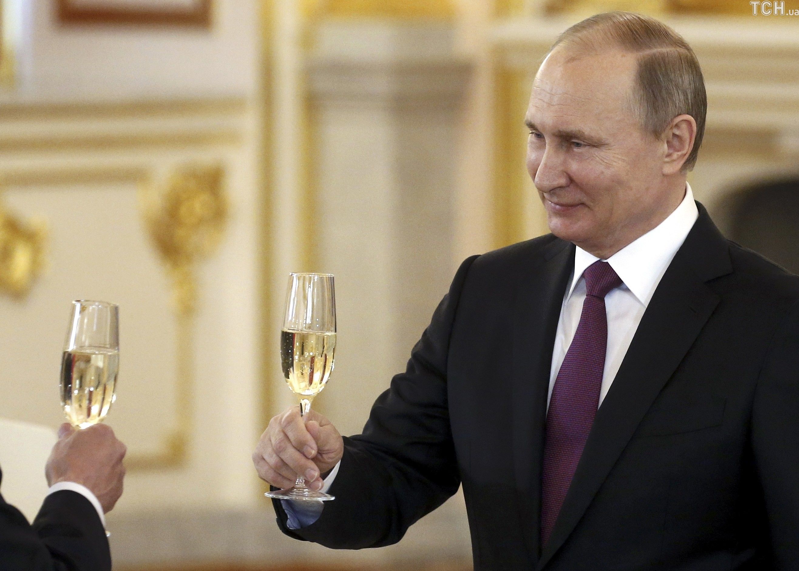путін