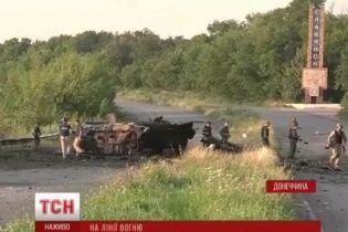 В Славянске нашли могильник замученных террористами мирных жителей