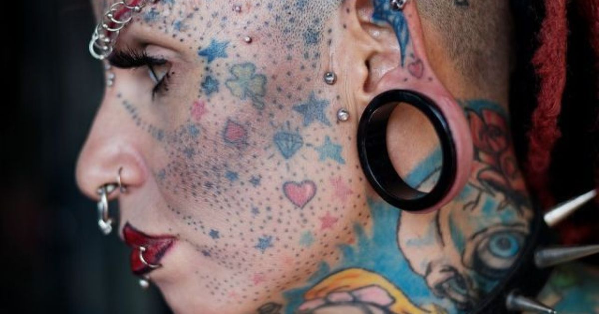 Reinkarnation tattoo piercing köln