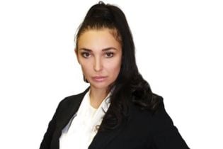 Чиновниця ДМС розповіла деталі справи про хабар від агента НАБУ