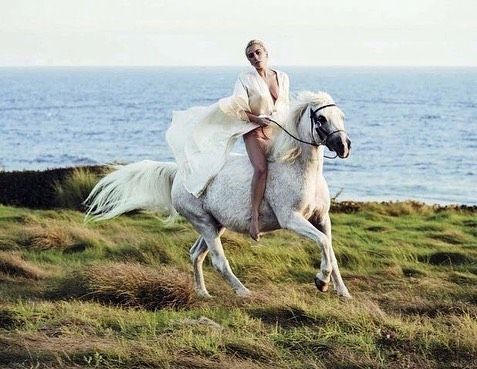   Lady Gaga on a horse 