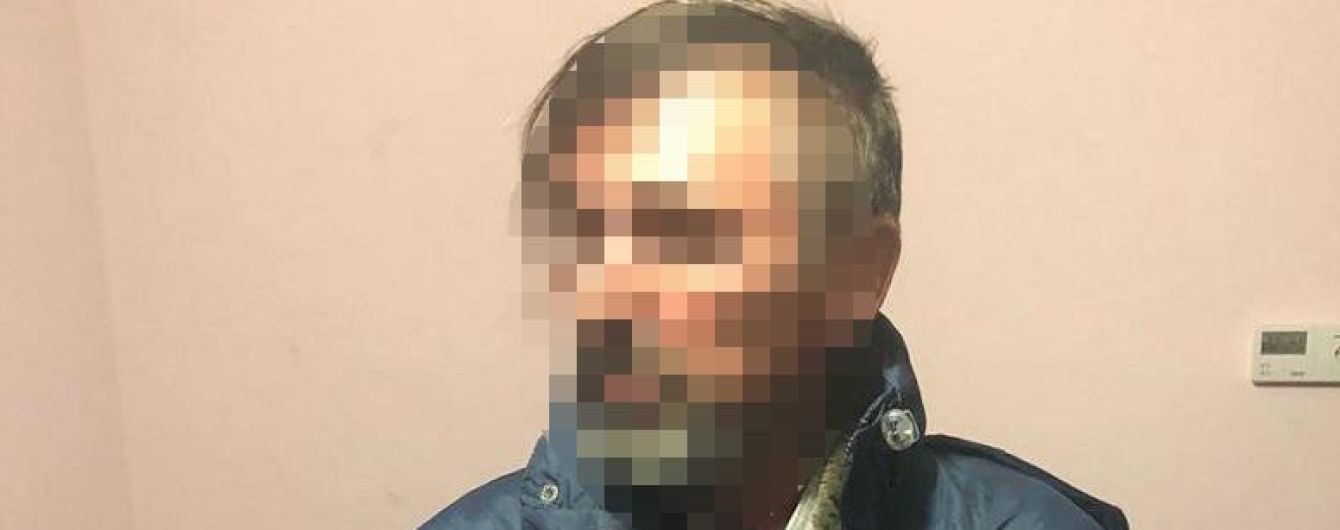 В Киеве задержали еще одного подозреваемого в поджоге магазина Roshen