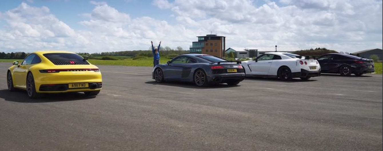 Новый Porsche 911 испытали в гонке с культовыми спорткарами. Видео