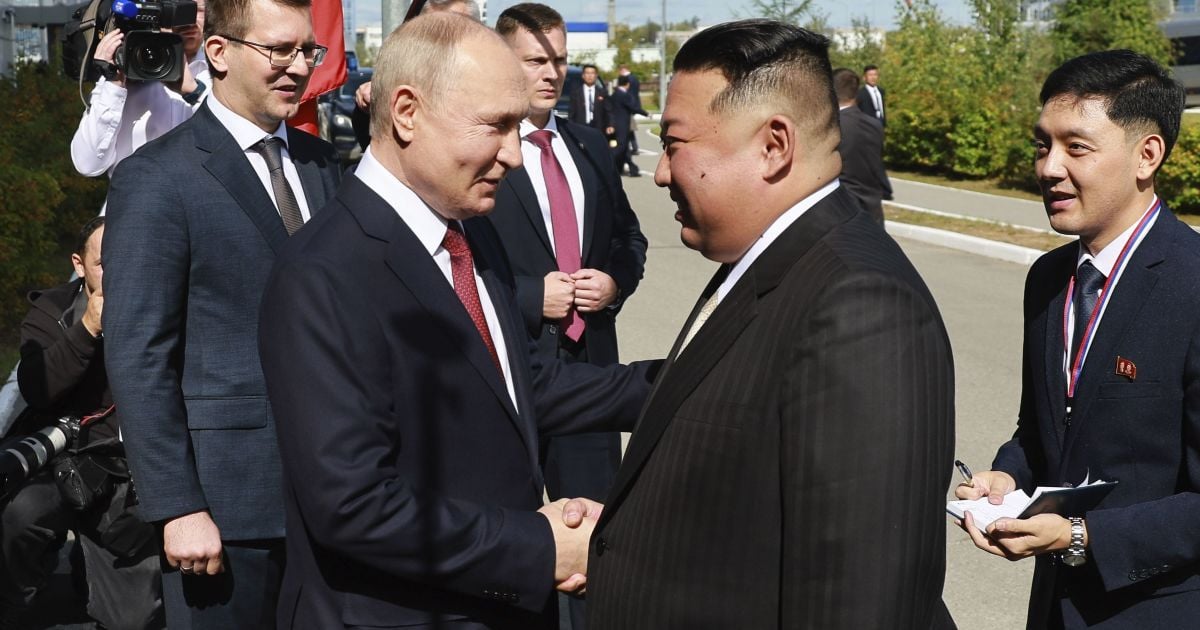 Кім Чен Ин і Володимир Путін.