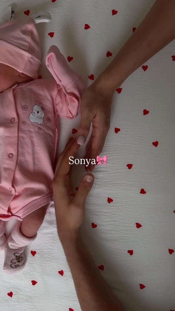 Марина Бех-Романчук та Михайло Романчук з донькою / © instagram.com/marynabekh