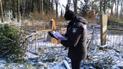 Рубил деревья на кладбище: в Черниговской области предприниматель повредил 15 могил