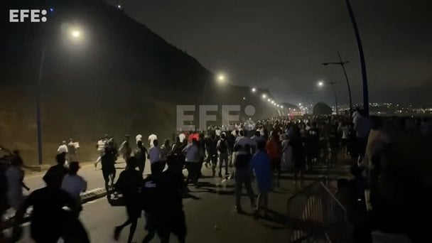Мігранти в Іспанії. Скриншот з відео. / © EFE
