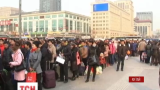 Десятки тысяч китайцев едут домой на семейные торжества