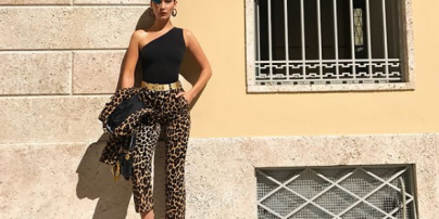 С зеленой челкой и в леопардовых брюках: Белла Хадид на Неделе моды в Милане