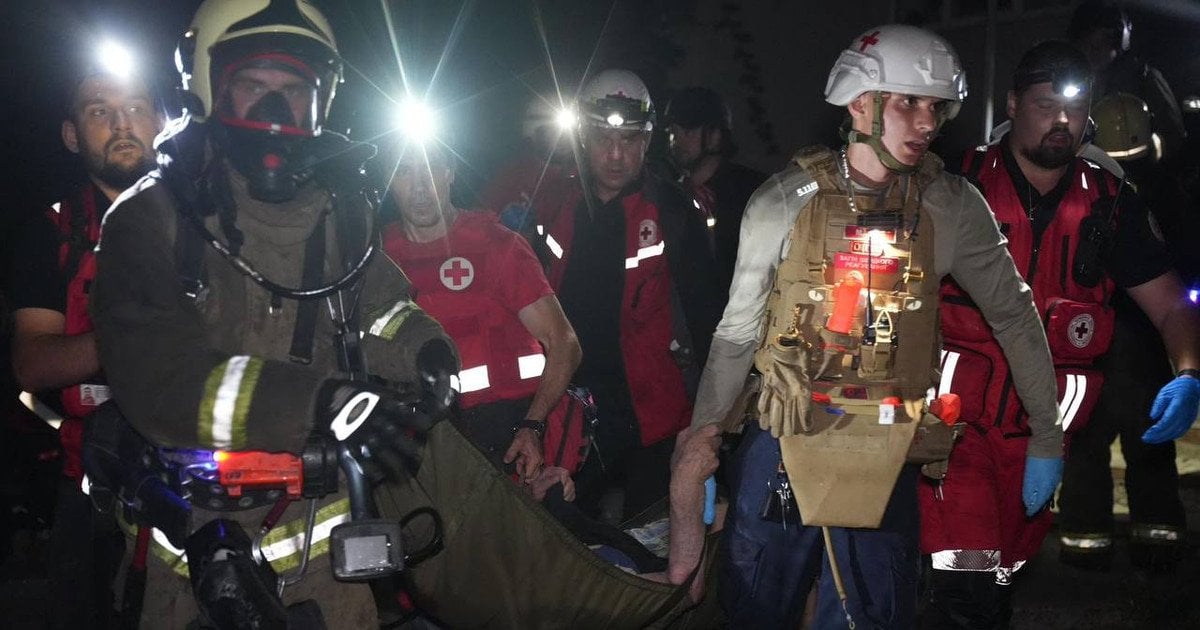 Rescuers at the scene of the attack