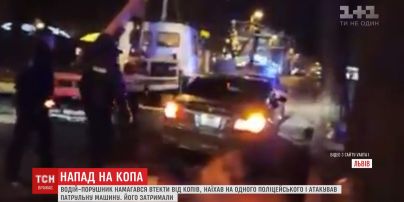 Водитель-нарушитель при побеге от копов наехал на полицейского и атаковал патрульное авто