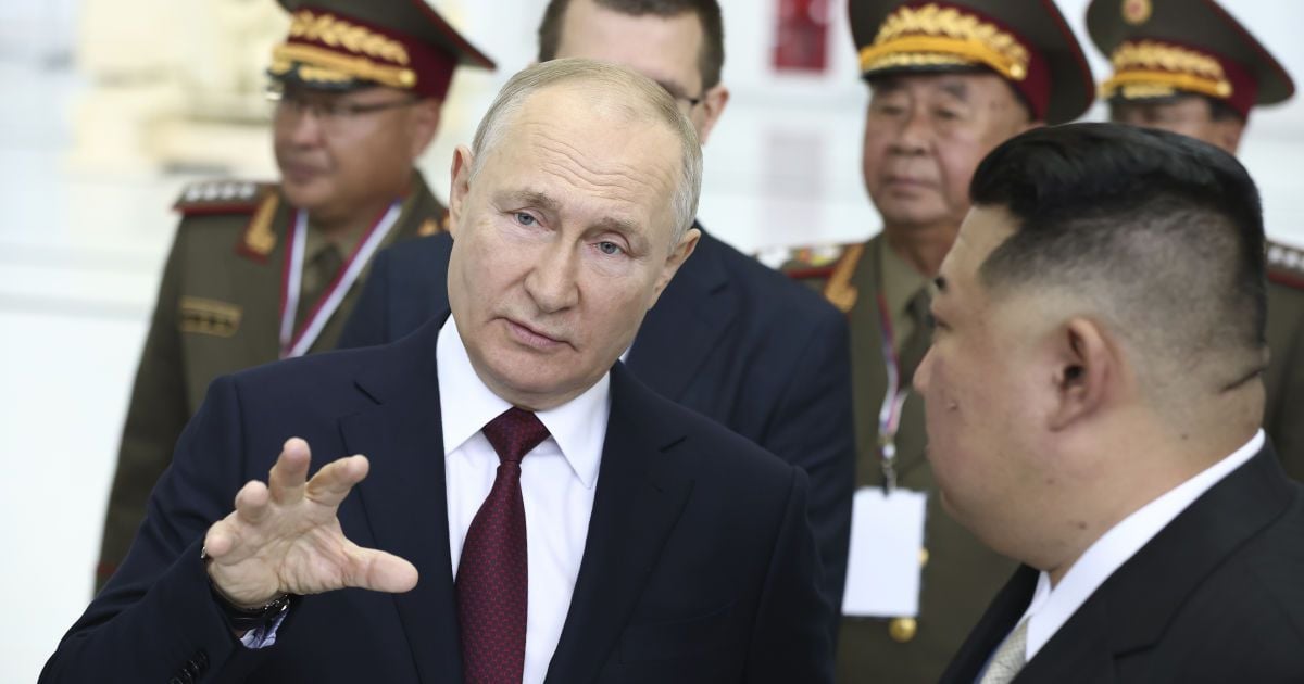 Кім Чен Ин і Володимир Путін.