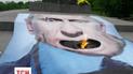 В столице активисты совершили яркий перфоманс с фотографией Путина