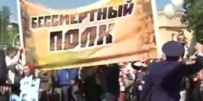 На акции ко Дню победы в Киеве из-за георгиевской ленты подрались парень с женщиной