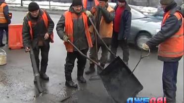 Где в Киеве асфальт сошел вместе со снегом