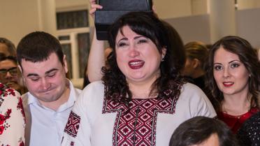 Герой АТО освідчився коханій на відкритті фотовиставки &laquo;Переможці&raquo; / © прес-служба каналу "1+1"