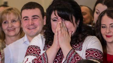 Герой АТО освідчився коханій на відкритті фотовиставки &laquo;Переможці&raquo; / © прес-служба каналу "1+1"