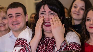 Герой АТО освідчився коханій на відкритті фотовиставки &laquo;Переможці&raquo; / © прес-служба каналу "1+1"