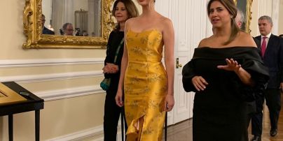 В золотом платье и с красной помадой: вечерний образ Иванки Трамп