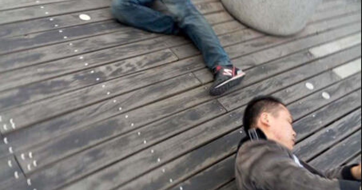 Рабочих позорно наказали / © politics.people.com.cn