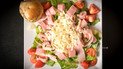 Салат з шинкою печерицями сиром та кукурудзою