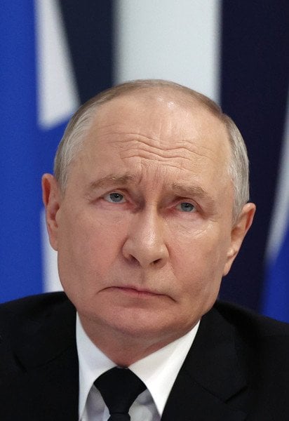 Путин