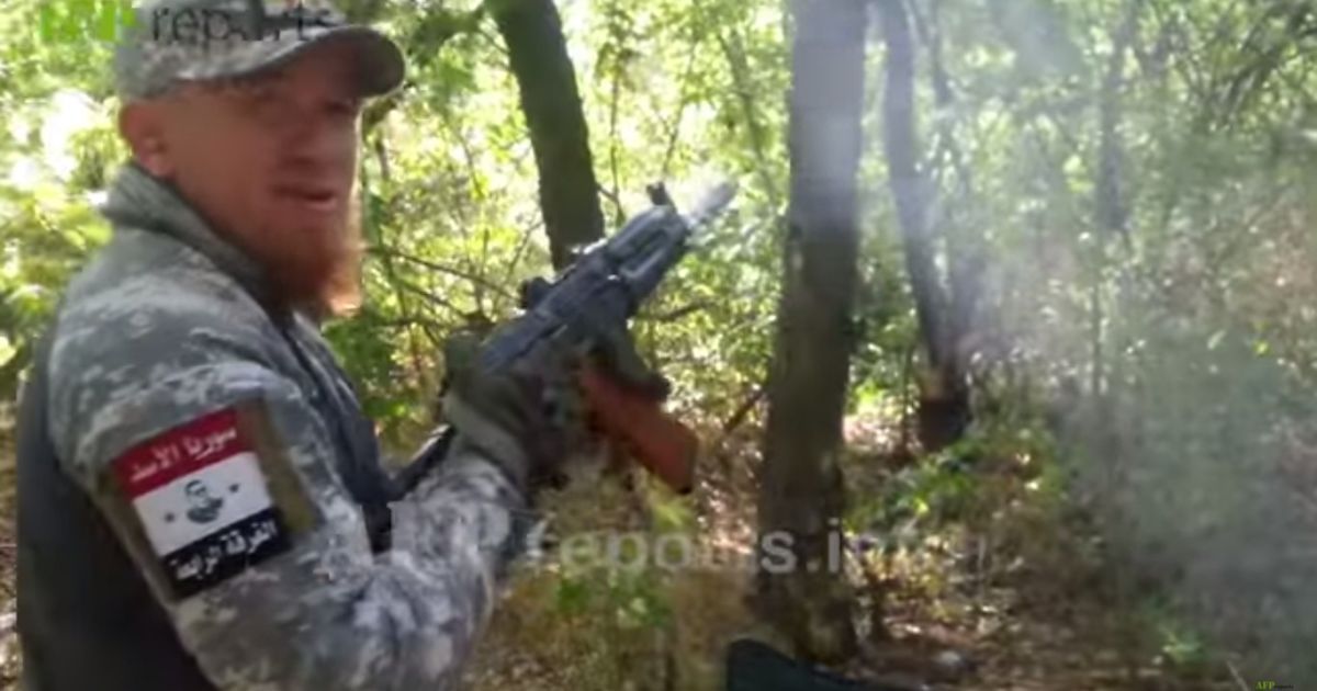 Моторола засветился с нашивками Асада