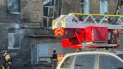Повреждение школы в Киеве в результате атаки 1 октября